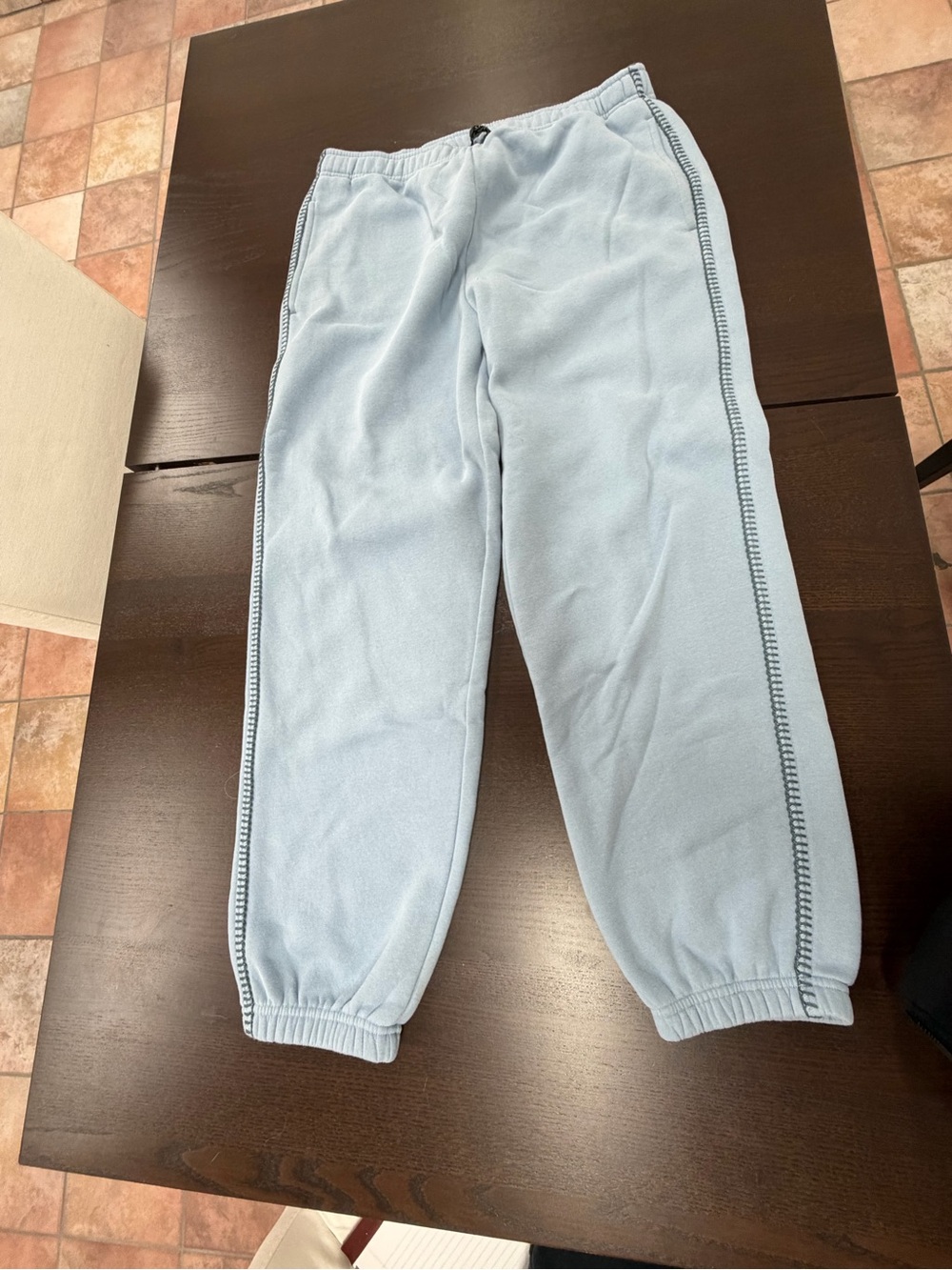 One pair of size large ugg sweatpants with jogger bottom. Like new